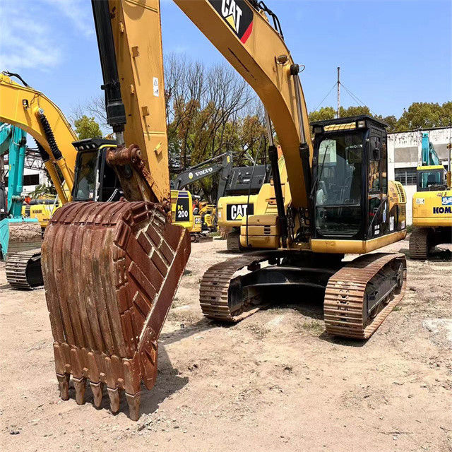 23 toneladas, listas para el trabajo y experimentadas Japón Caterpillar 323 D en buen estado.
