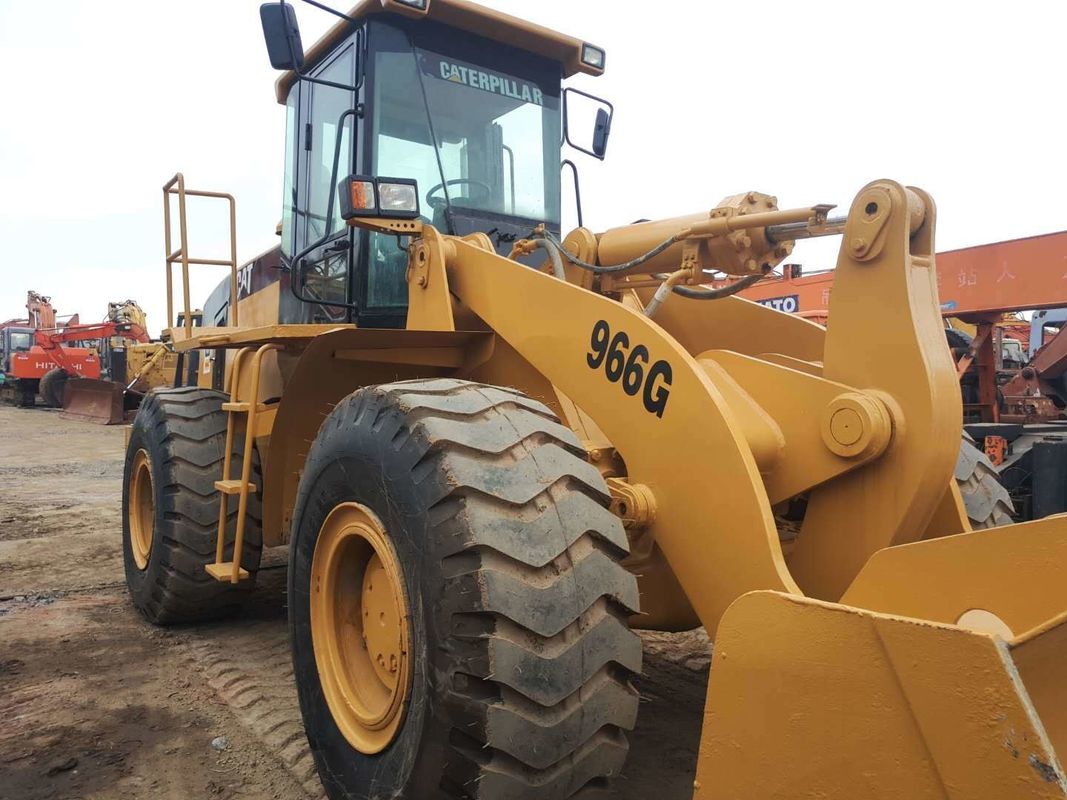 Cargador de ruedas Cat 966G usado asequible con un motor de balde y oruga de 5,5 m3