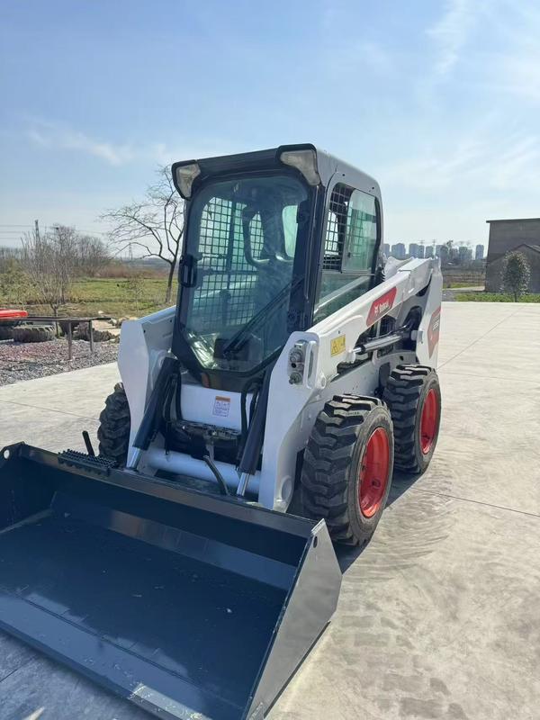 Usado Bobcat S550 Cargador de dirección de patinaje China Exportador confiable Ancho de transporte 1.727m